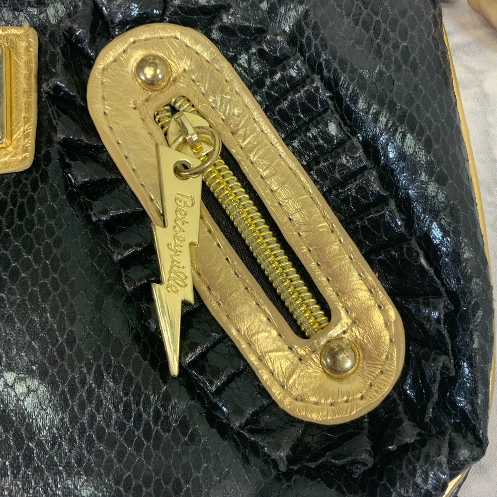 Betsey Johnson Betseyville Wristlet Black gold Ruffle Lightening